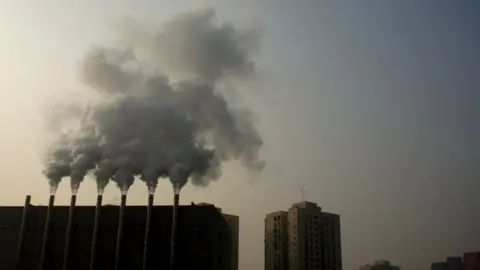 AFP/Getty Images Factory chimneys giving off smoke in Beijing, China