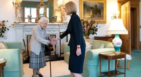 Shutterstock Liz Truss greets the Queen