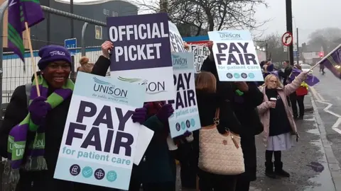 Striking hospital staff picketing Luton & Dunstable hospital