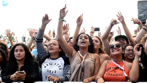 Getty Images Audience at a festival