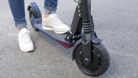 Getty Images feet on e bike