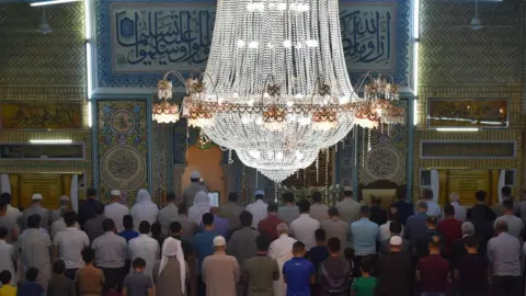 Getty Images Muslims perform the first 'Tarawih' prayer on the beginning of the Islamic Holy month of Ramadan in Iraq