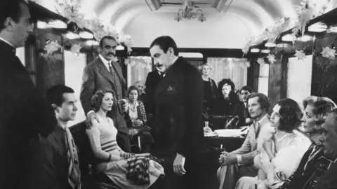 Getty Images Hercule Poirot (Albert Finney) in Christie’s Murder on the Orient Express – the Belgian detective “