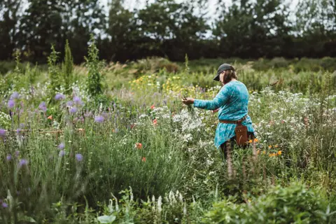 Joanne Coates Flower farmer Paula works on her farm in Foulden village in the Scottish Borders