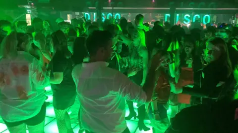 BBC People in Halloween fancy dress on the dance floor at The Chapel nightclub in Salisbury