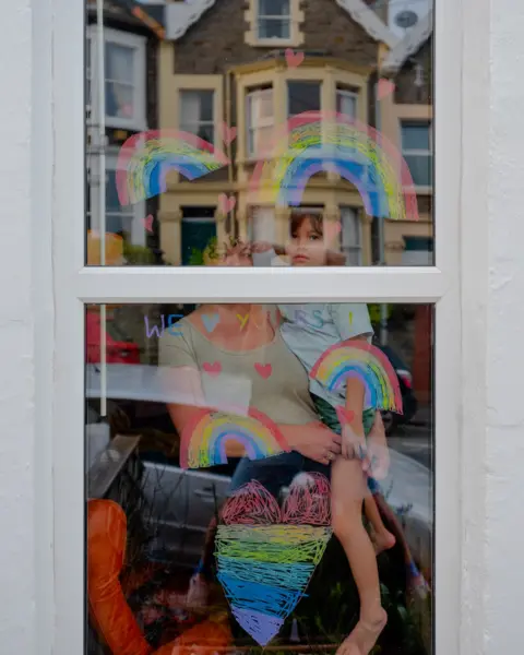 Tom Skipp Xander at the window