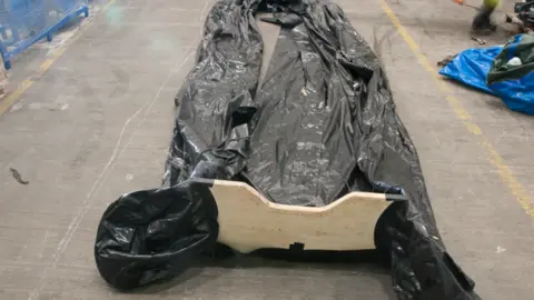 CPS The deflated remains of the boat