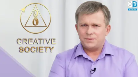 YouTube/AllatRa TV Still from an AllatRa TV video, where you can see soft-spoken chiropractor Igor Danilov promoting the Creative Society.