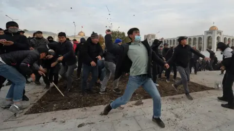 Getty Images Supporters of politician Sadyr Japarov fought with protesters supporting former president Almazbek Atambayev in Bishkek