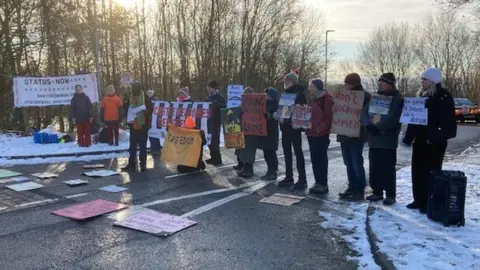 BBC Protestors holding banners outside Derwentside Immigration Removal Centre