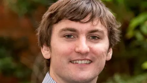 QUB Dr John Moriarty