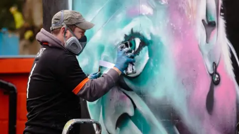 Jaime Bunting Photogrpahy Mural being created