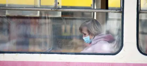 Getty Images The capital Kyiv goes into lockdown on Monday and use of public transport will be limited