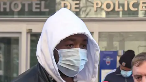 AFP French music producer, identified only as Michel, talking to the media outside the IGPN (France's National Police General Inspectorate)