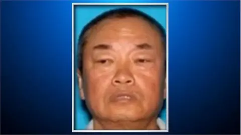 Police handout/ CBS Zhao Chunli, seen in an undated driver's licence photo