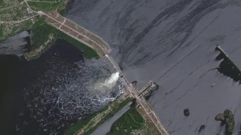 Reuters/Maxar Technologies A satellite image shows Nova Kakhovka Dam in Kherson region, Ukraine May 28, 2023.