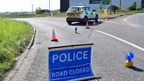 Pacemaker Moira road closure in Crumlin police sign