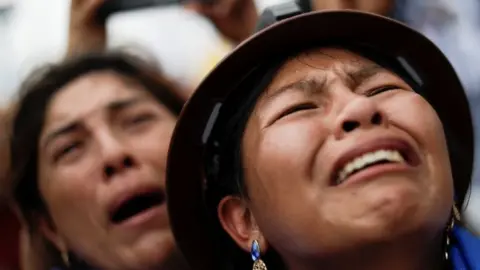 Reuters A woman cries during Bolivia's former President Evo Morales"s caravan, after his return to the country, in Chimore, Bolivia November 11, 2020