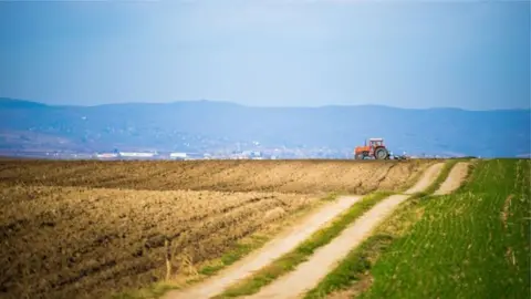 Getty Images Tractor on a farm