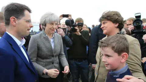 EPA Northern Ireland Secretary of State James Brokenshire with UK PM Theresa May and DUP leader Arlene Foster