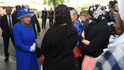 EPA The Queen meets Grenfell residents