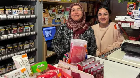 Rahime's daughter (R) is one of five million first-time voters in Sunday's election