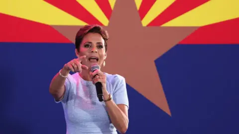 Getty Images Kari Lake speaking a rally before the election