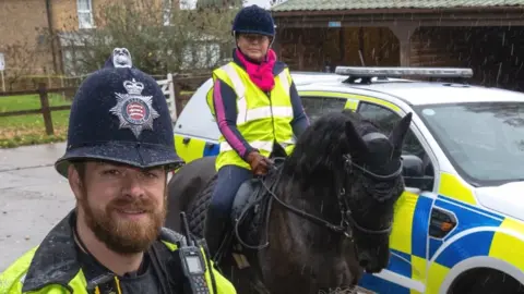 Essex Police Police officer and woman on a horse