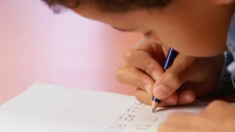 South Gloucestershire Council Pupil writing letters