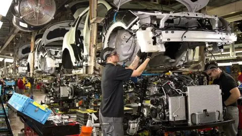 Getty Images Workers at Nissan Sunderland plant