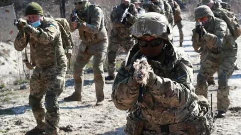 Reuters Ukrainian military exercises near Kyiv - 10 April