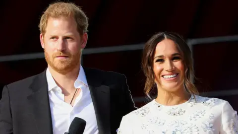 Reuters Britain"s Prince Harry and Meghan Markle appear onstage at the 2021 Global Citizen Live concert at Central Park in New York, U.S., September 25, 202