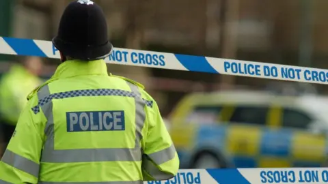 PA Police officer at a crime scene