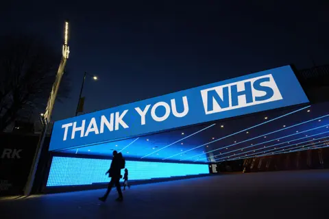 PA Media A sign by Wembley Park Tube Station in London that thanks the hardworking NHS staff