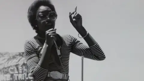 Steve Cagan 9to5 Cleveland holds an action in protest of National City Bank