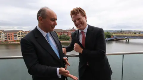 PA Media The UK's Investment Minister Lord Dominic Johnson and the United States special envoy to Northern Ireland Joe Kennedy III