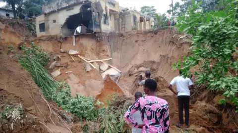 Reuters Wreckage caused by floods in DR Congo