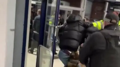 OTHER Fans clashing with police