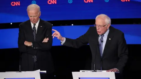 Getty Images Sanders and Biden at the Iowa Democratic Debate