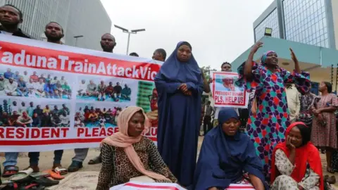 Reuters A protest about the train hostages in Abuja, Nigeria - July 2022