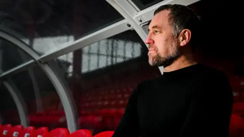 GTFC David Artell in dugout