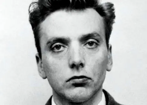 AFP PHOTO / GREATER MANCHESTER POLICE  A black and white police handout photograph released by Greater Manchester Police showing Ian Brady