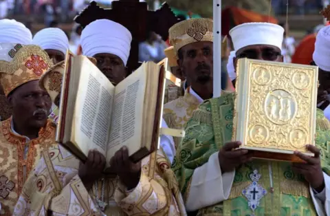 Anadolu Agency/Getty Images Ethiopian Christian believers, wearing traditional clothes, celebrate the Meskel Festival, commemorating the discovery of the True Cross by the Roman Empress Helena (Saint Helena) in the fourth century in Addis Ababa, Ethiopia on September 26, 2018. Thousands of Christian Orthodoxes gathered with their traditional white clothes.