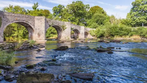 Getty Images The River Usk and Llangynidr Bridge in the Brecon Beacons National Park