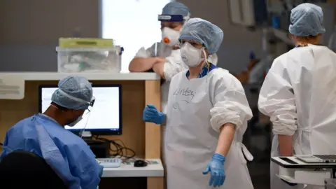 Getty Images NHS staff in PPE