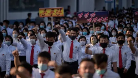 AFP North Korean students take part in a rally denouncing "defectors from the North" as they march from the Pyongyang Youth Park Open-Air Theatre to Kim Il Sung Square in Pyongyang on June 8, 2020