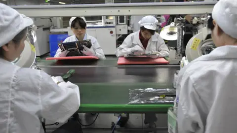 Getty Images Chinese factory workers