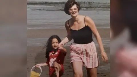 Ayesha Giles Ayesha and her mother