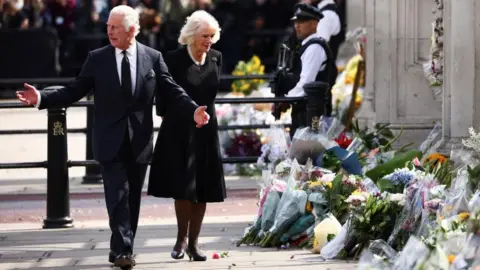 Reuters King Charles and Queen Camilla