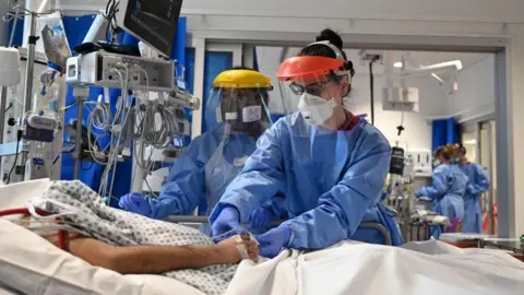 Getty Images Medics in an ICU unit during coronavirus pandemic in UK